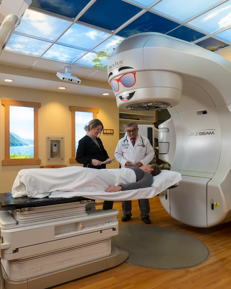 A patient being positioned for treatment on the linear accelerator