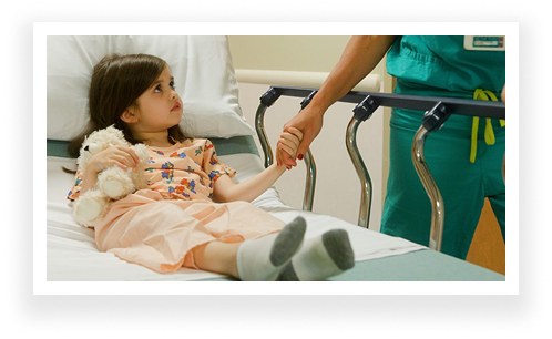 Small girl holding a dr hand